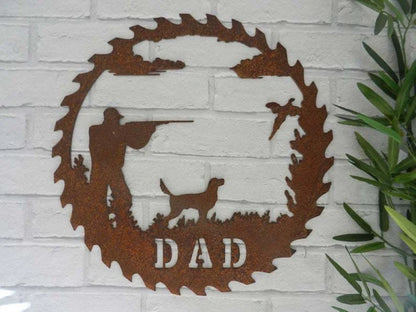 Handcrafted metal fishing scene pendant for garden decoration