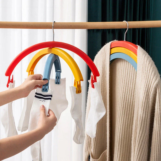 Premium three-tier clothes drying rack with 360-degree rotating design, non-marking construction, and windproof clip for efficient and convenient laundry drying.