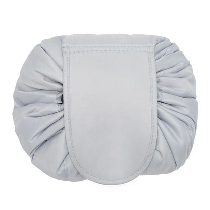 Stylish and practical cosmetic bag with multiple color and pattern options, featuring a drawstring closure and roomy interior for easy organization during travel.