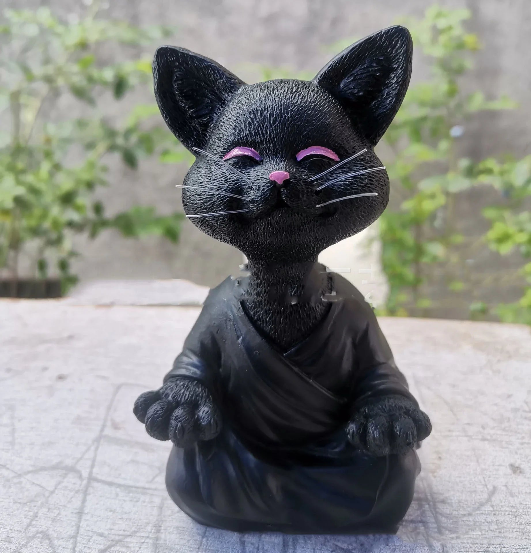 Captivating Black Buddha Cat Figurine crafted from premium resin, perfect for meditation spaces, yoga studios, and home decor