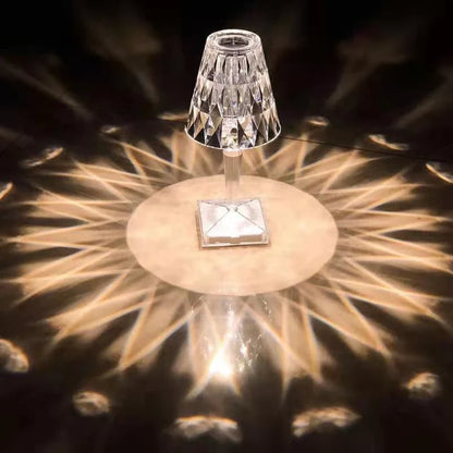 Elegant acrylic desk lamp with mesmerising prismatic lighting effects, perfect for enhancing the ambiance in any room.