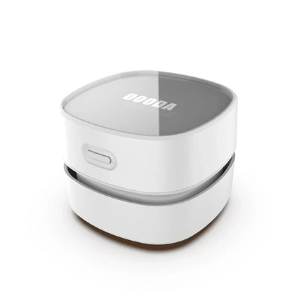 Compact desktop vacuum cleaner with USB charging and strong suction power