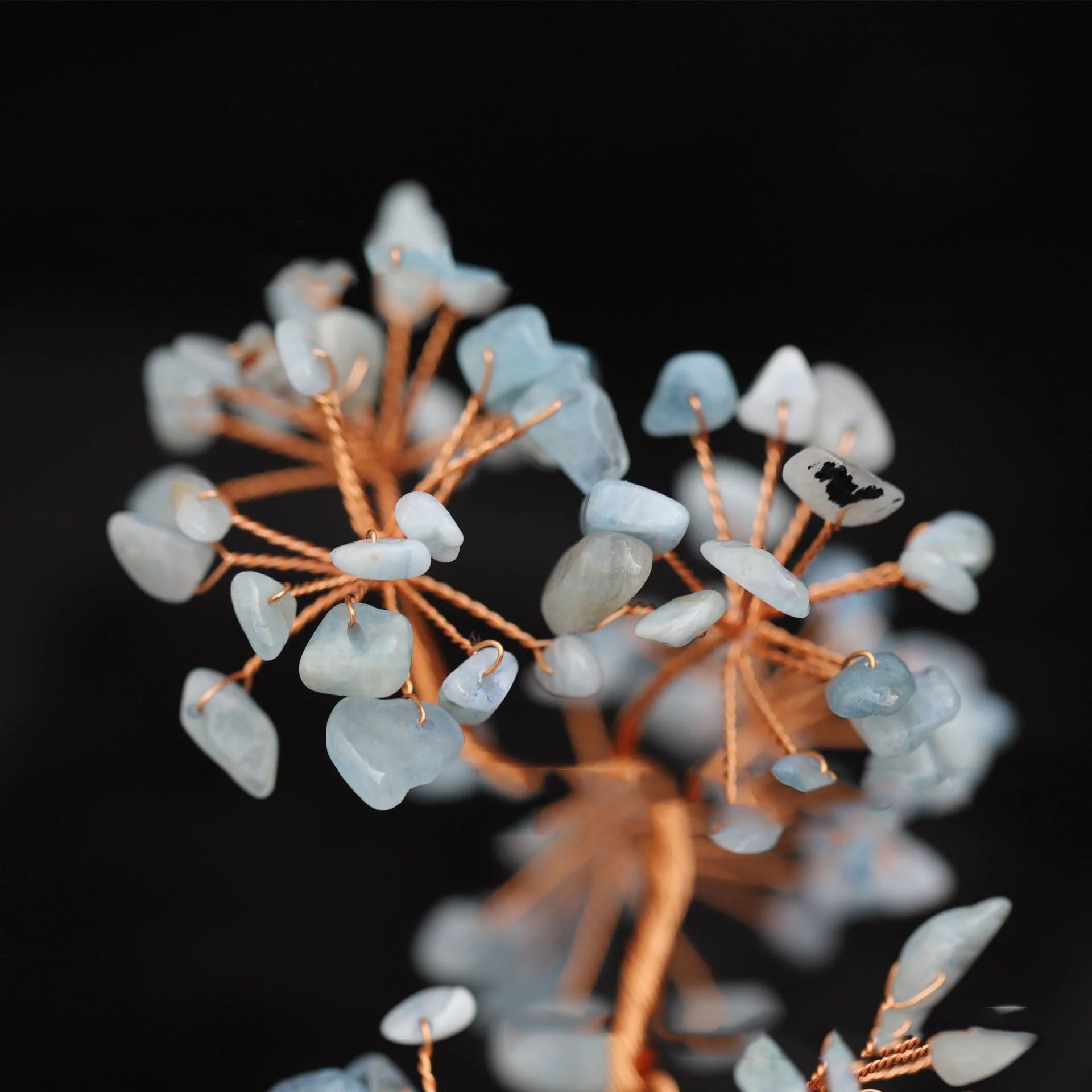 Aquamarine Crystal Fortune Tree Ornament with light blue hue and plant design