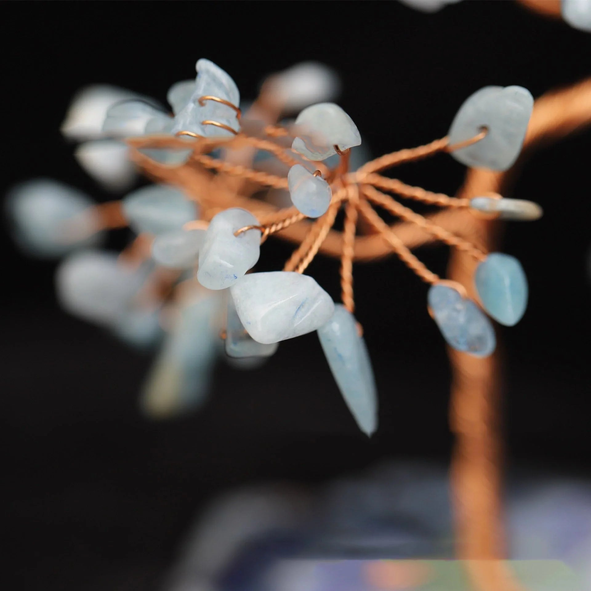 Aquamarine Crystal Fortune Tree Ornament with light blue hue and plant design