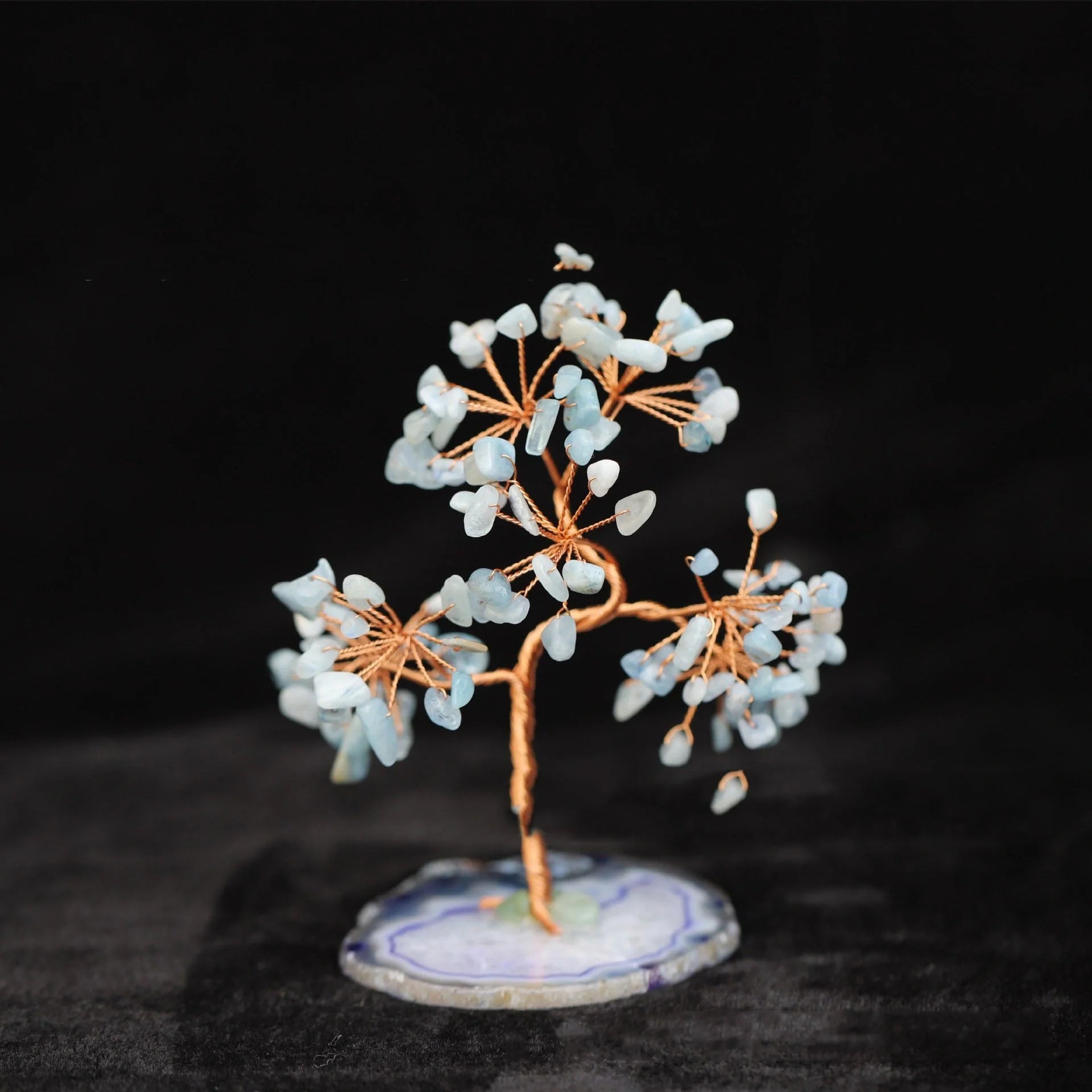 Aquamarine Crystal Fortune Tree Ornament with light blue hue and plant design