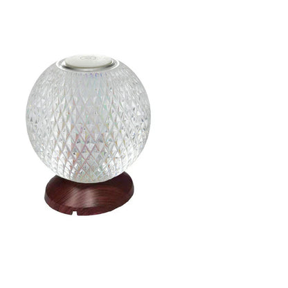 Elegant acrylic crystal bedside lamp with customisable RGB lighting, creating a warm and relaxing atmosphere in the bedroom