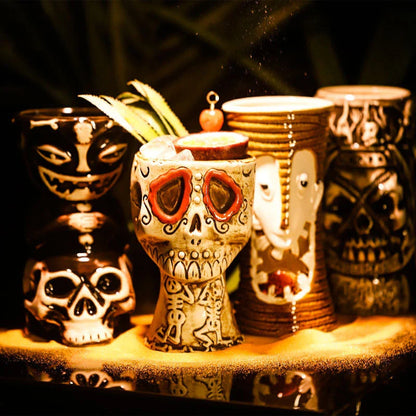 A ceramic tiki mug with a 3D decorative face, perfect for tropical cocktails, smoothies, and other chilled beverages.