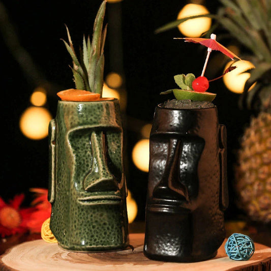 A ceramic tiki mug with a 3D decorative face, perfect for tropical cocktails, smoothies, and other chilled beverages.