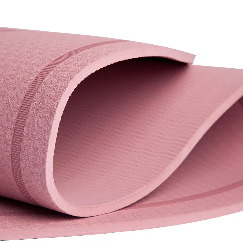 Double-sided TPE skipping mat in pink and grey, featuring anti-skid and shock-absorbing properties for indoor workouts