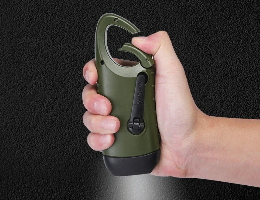 Hand-cranked LED flashlight with solar panel and carabiner clip