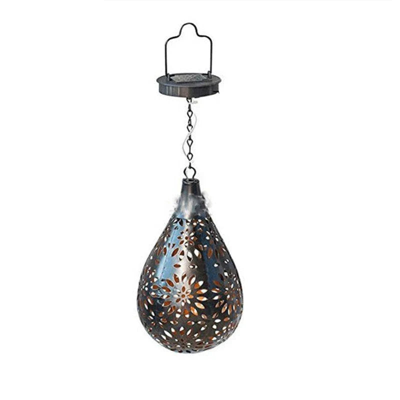 Solar-powered outdoor hanging lantern with flower-patterned shade, made of durable metal for long-lasting use in gardens, patios, and pathways.