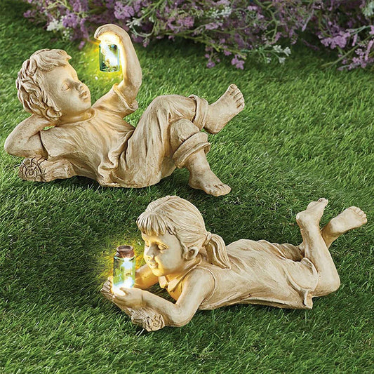 Enchanting solar-powered resin garden statue with delightful firefly lights for decorating outdoor spaces in the UK