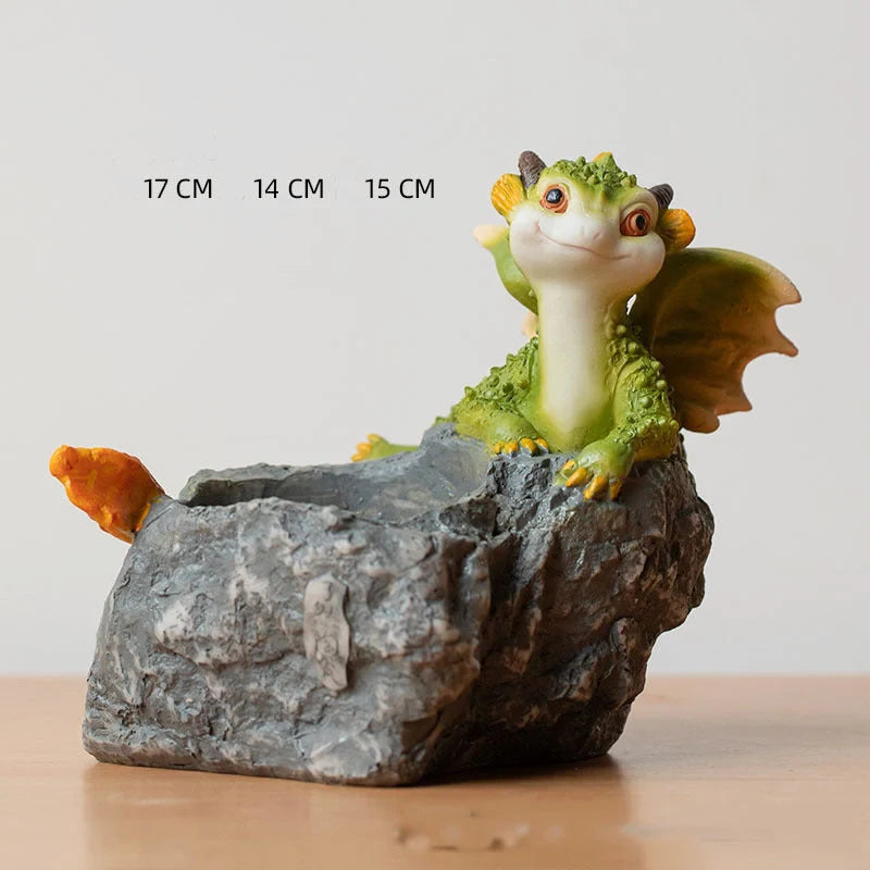 Hand-painted dinosaur succulent pots in three styles: Egg, Lying Stone, and Reading Dinosaurs