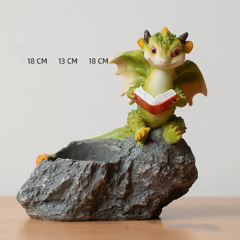 Hand-painted dinosaur succulent pots in three styles: Egg, Lying Stone, and Reading Dinosaurs
