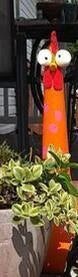 Decorative Chicken Statues in various vibrant colors for garden, patio, and yard decor