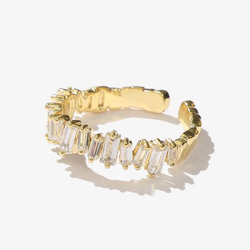 18K gold plated index finger ring with zircon accents on a white background