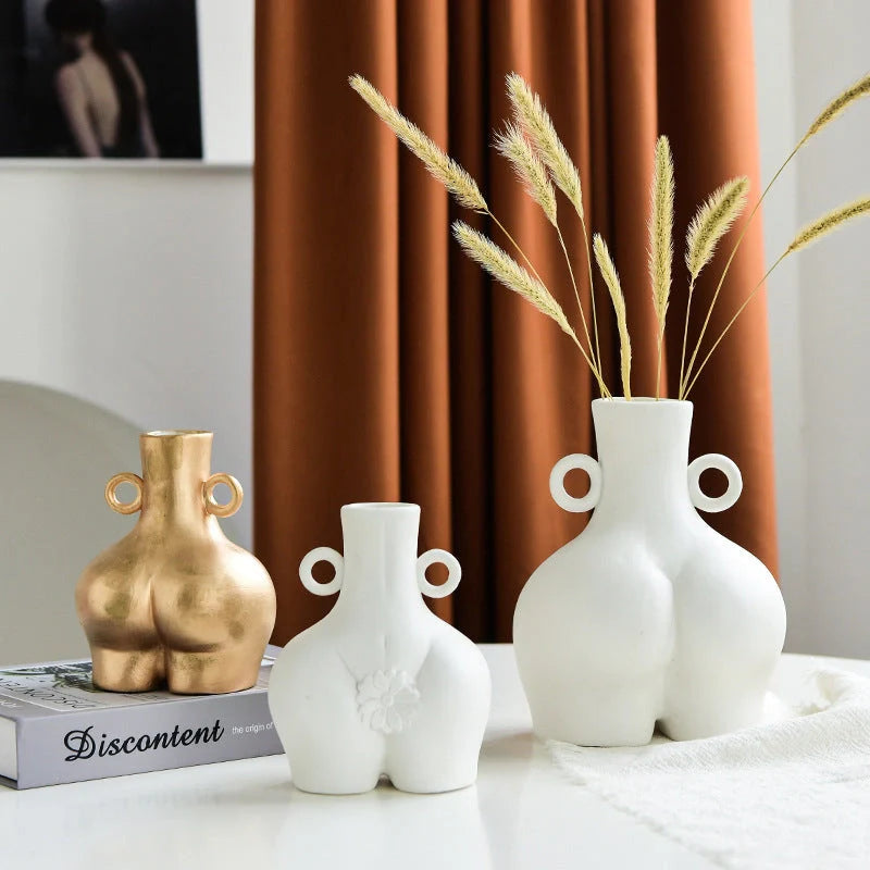 Handmade Nordic Human Body Ceramics Vases in white and golden, perfect for home decor.