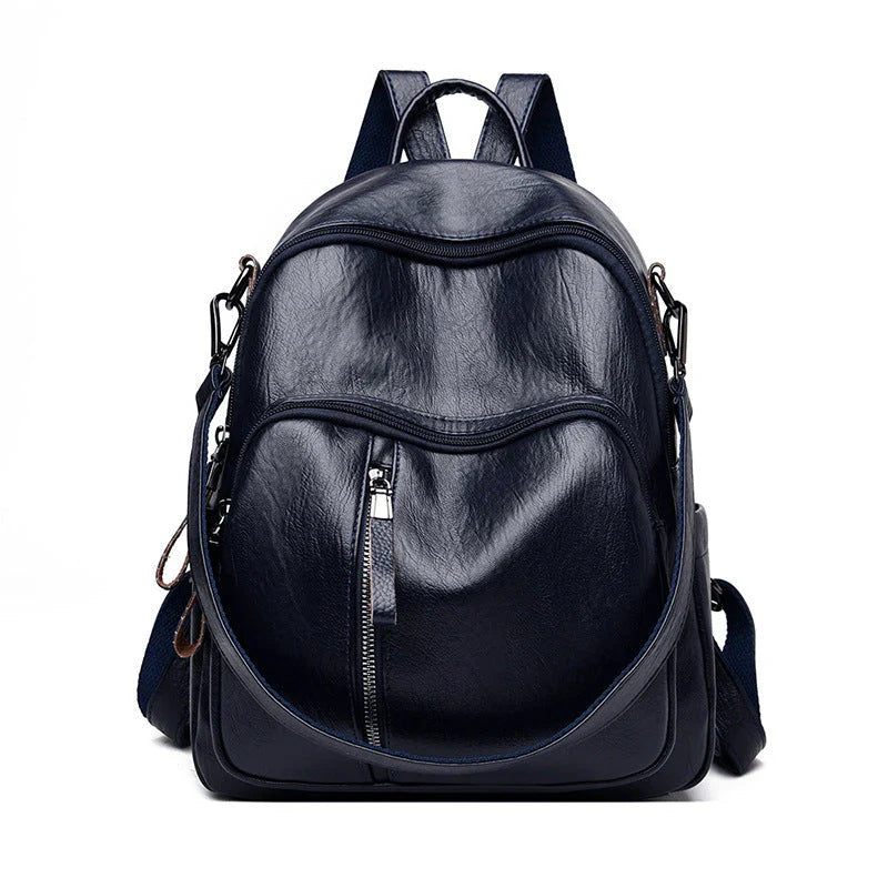 Stylish PU backpack in black, red, and blue colors with multiple compartments and adjustable straps for versatile and organized storage