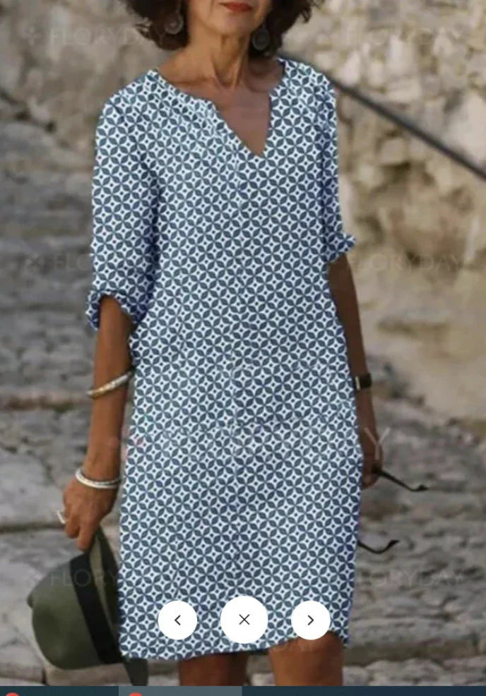Vibrant mid-length dress with stylish sleeves in a variety of colors including yellow, red, and light green