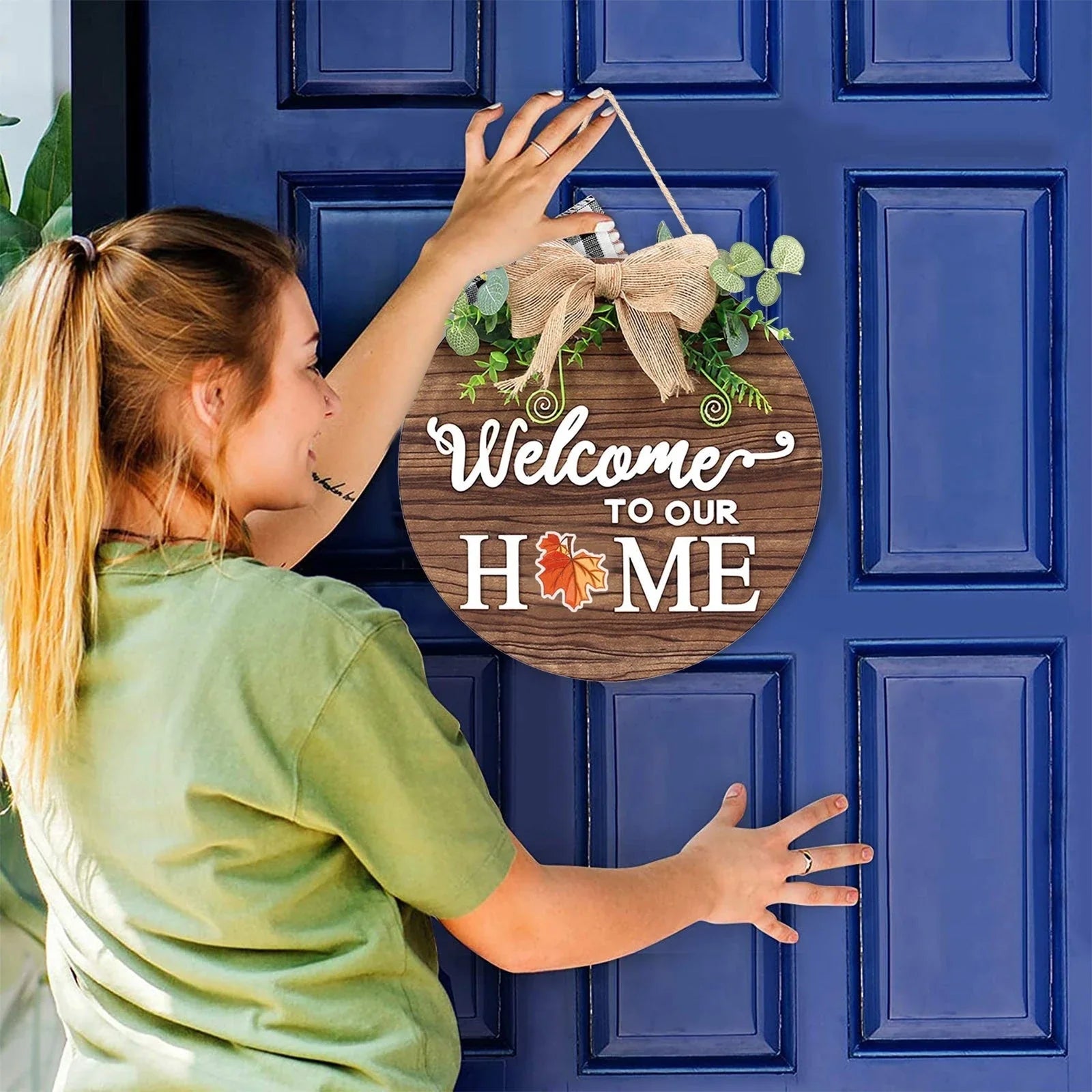 Versatile wooden door hanger with interchangeable seasonal decor including flowers, hearts, pumpkins, and more