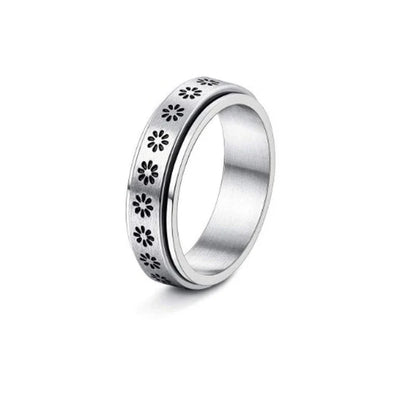 Elegant stainless steel spinner ring with a captivating moon and star design that rotates effortlessly for a calming tactile experience
