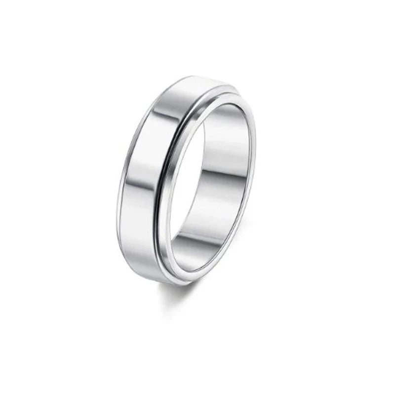 Elegant stainless steel spinner ring with a captivating moon and star design that rotates effortlessly for a calming tactile experience