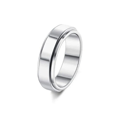 Elegant stainless steel spinner ring with a captivating moon and star design that rotates effortlessly for a calming tactile experience