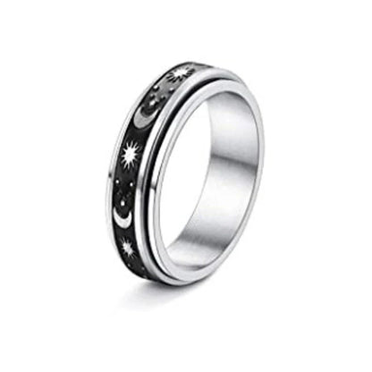 Elegant stainless steel spinner ring with a captivating moon and star design that rotates effortlessly for a calming tactile experience