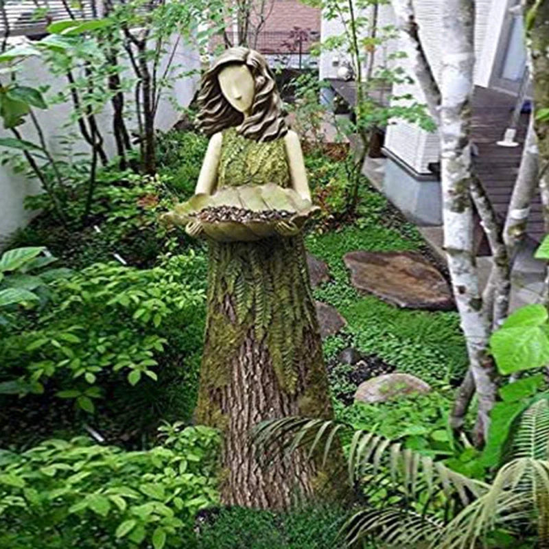 Sherwood Fern Fairy Statuary Resin Bird Feeder with leaf-shaped holder in garden setting