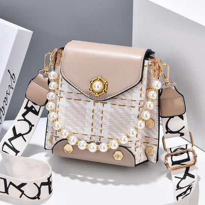 Premium crossbody phone bag with elegant pearl charm, made of durable PU leather and available in multiple color options