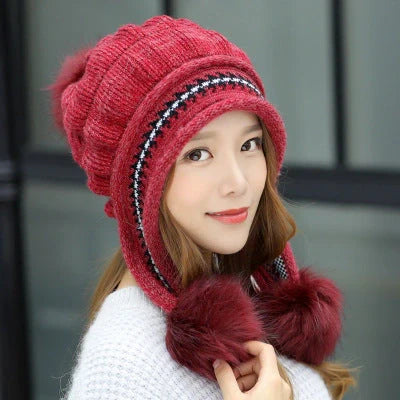 Knit fleece beanie with ear flaps and pompom in various colours for winter warmth