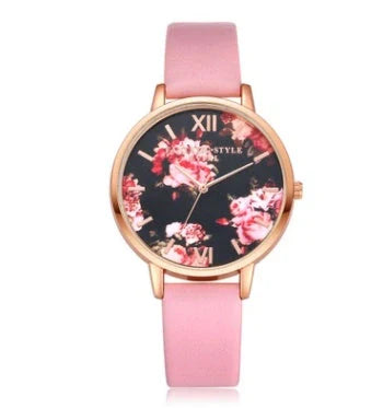 Rose gold quartz wrist watch with leather strap for women