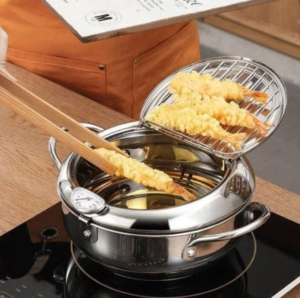 Premium stainless steel folding fryer with thermometer, perfect for frying french fries and other crispy dishes