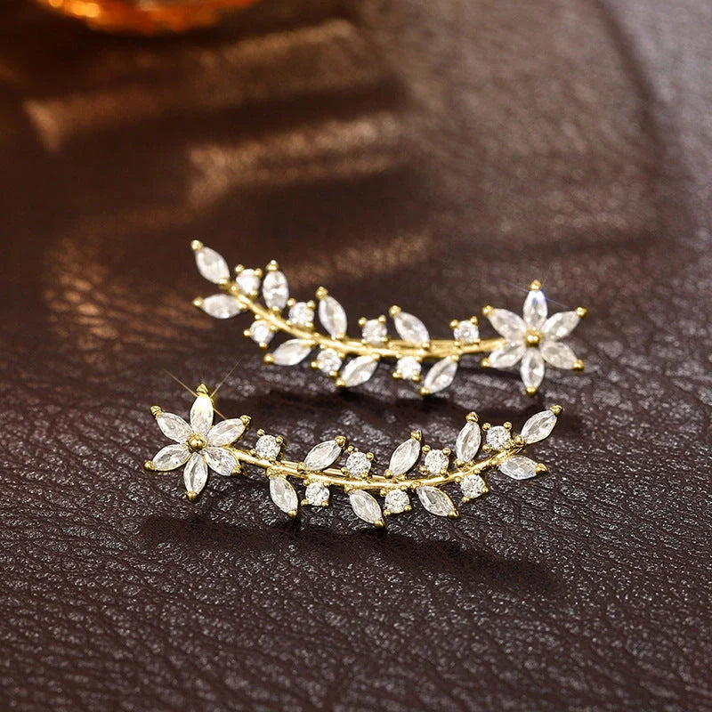 Stylish diamond flower earrings for women in white gold, gold, and rose gold