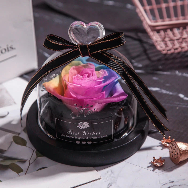 Enchanting Eternal Rose with LED lighting in a glass display, showcasing its timeless beauty and elegant design