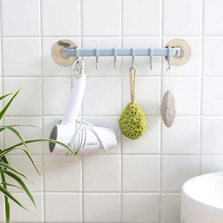 Premium adhesive wall hooks in various colours for organised storage in the kitchen, bathroom, and home