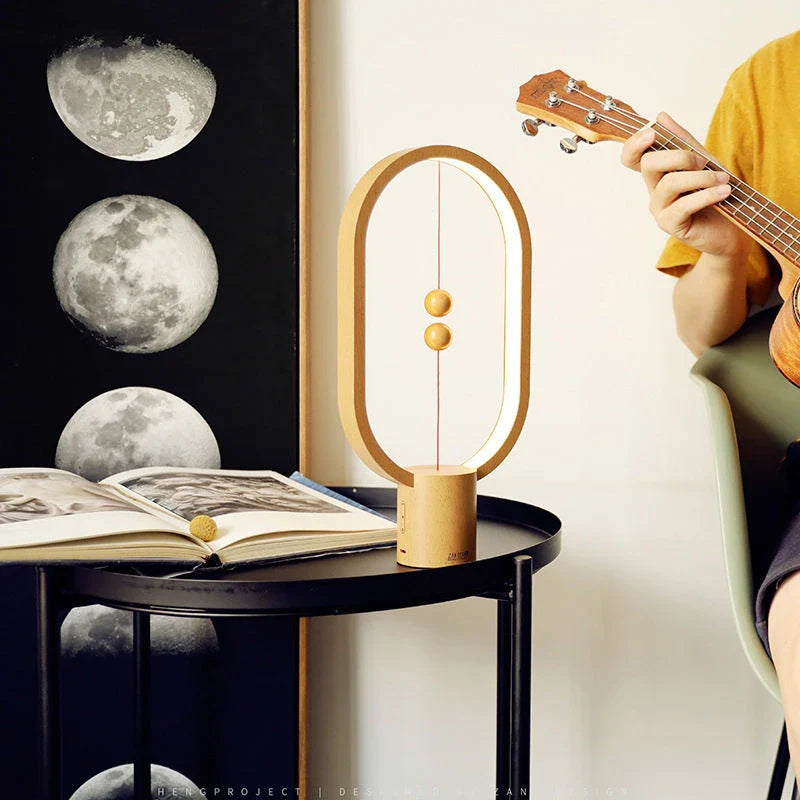 Premium magnetic bedside lamp with dual-colour LED lighting, touch-sensitive dimming controls, and sleek, compact design for bedroom