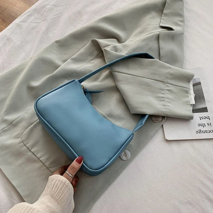 Versatile PU underarm bag in multiple colours for stylish everyday use