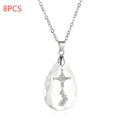 Elegant white drop pendant necklace with cross-chain design, made of premium electroplated alloy for a timeless and sophisticated look.