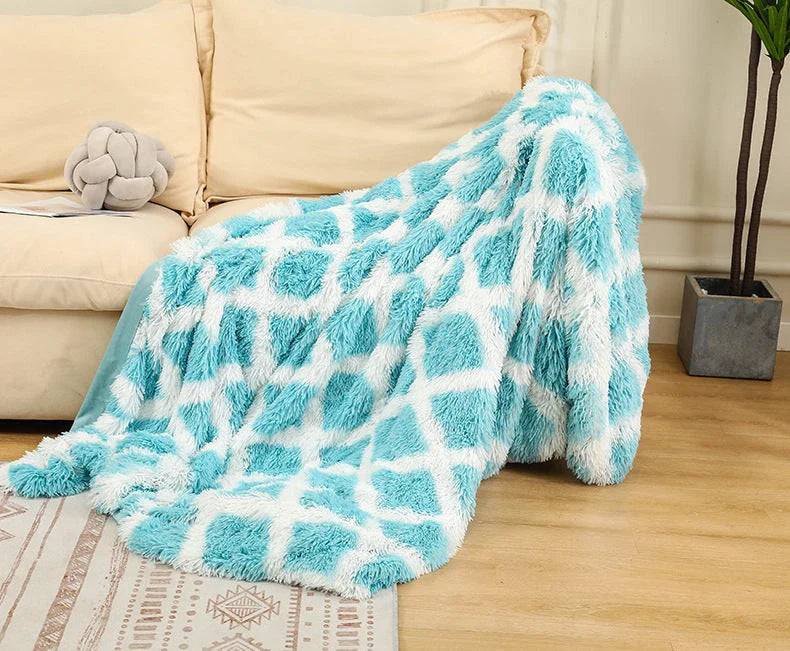 Cosy and luxurious faux fur throw blanket in a variety of colours and sizes, perfect for adding warmth and style to your living space