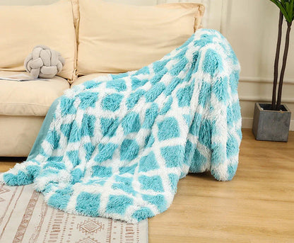 Cosy and luxurious faux fur throw blanket in a variety of colours and sizes, perfect for adding warmth and style to your living space