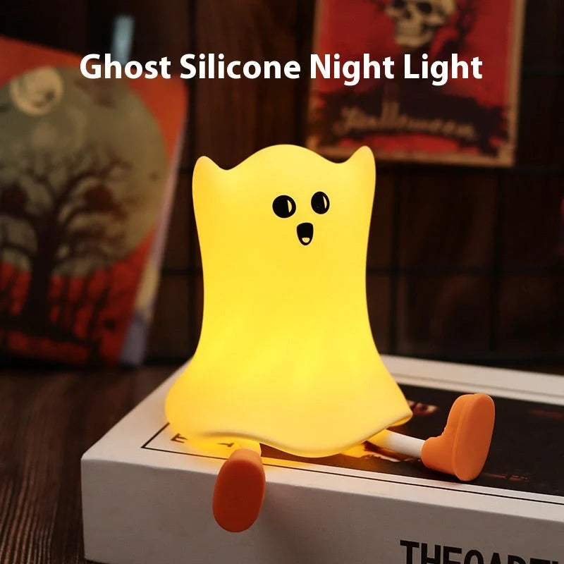 A Halloween-themed bedside lamp in the shape of a ghost, emitting a soft, calming glow.