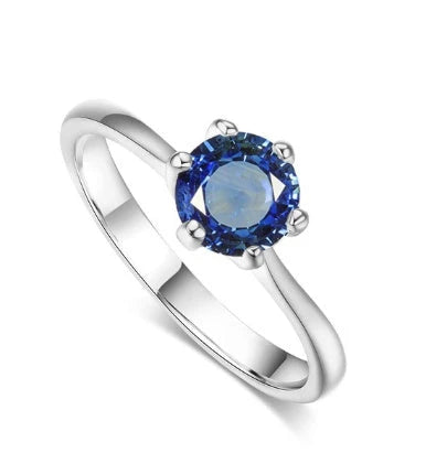 Elegant rose gold and zircon ring with a geometric design and sparkling zircon stones
