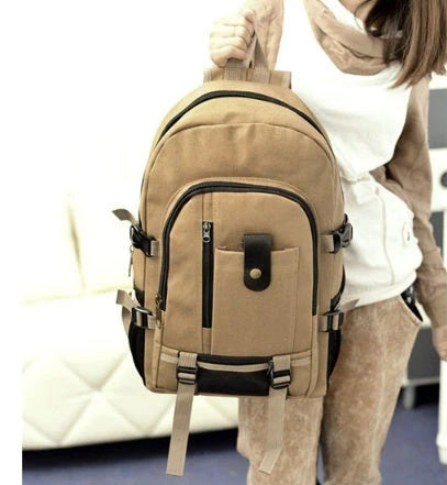 Men's canvas backpack with zippered opening, available in multiple colours including coffee, light khaki, and black.
