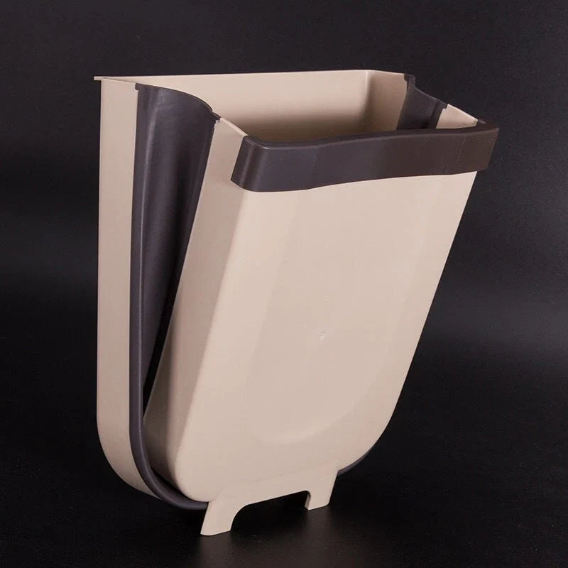 Foldable wall-mounted bin in brown and white colours, with a spacious 9-litre capacity and a sleek, space-saving design