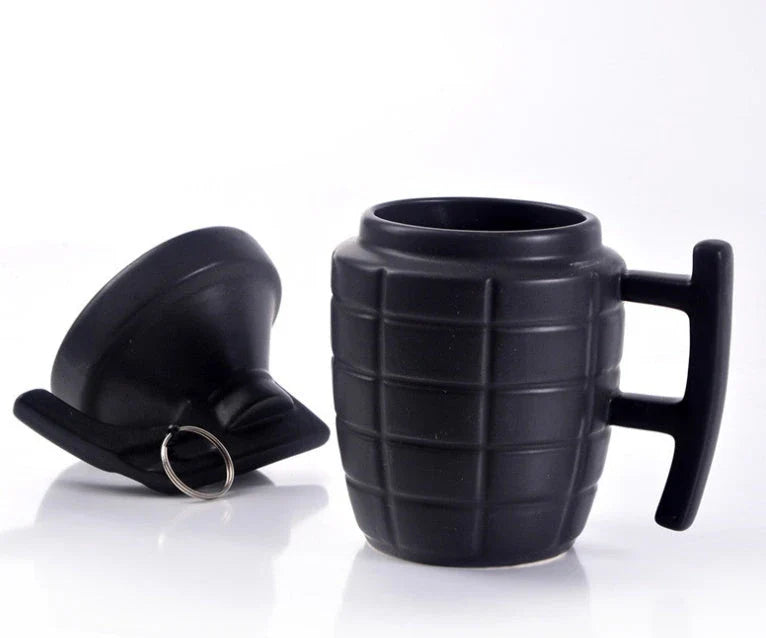 Grenade-shaped ceramic travel mug with secure lid, designed with a military-inspired style for use at home, work, or on the go