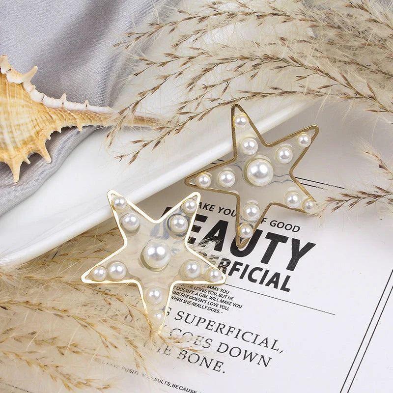 Charming peach heart and star stud earrings with elegant design and quality materials