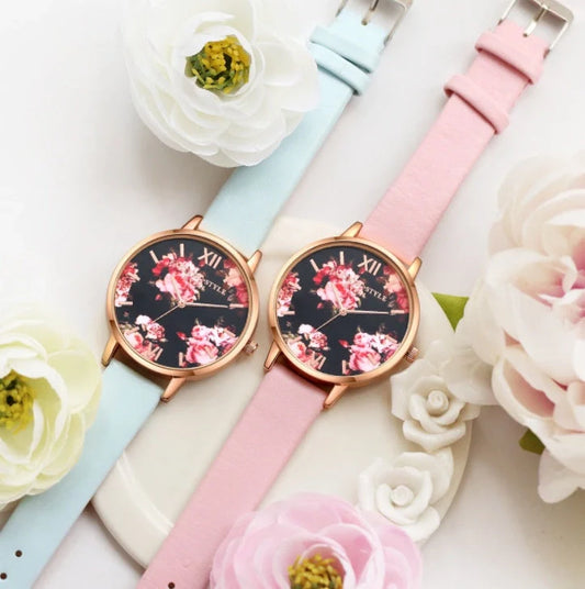 Rose gold quartz wrist watch with leather strap for women