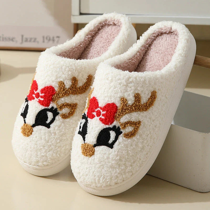Cozy Christmas slippers in festive designs like Santa Claus, Moose, and Gingerbread Man, featuring plush lining and durable soles