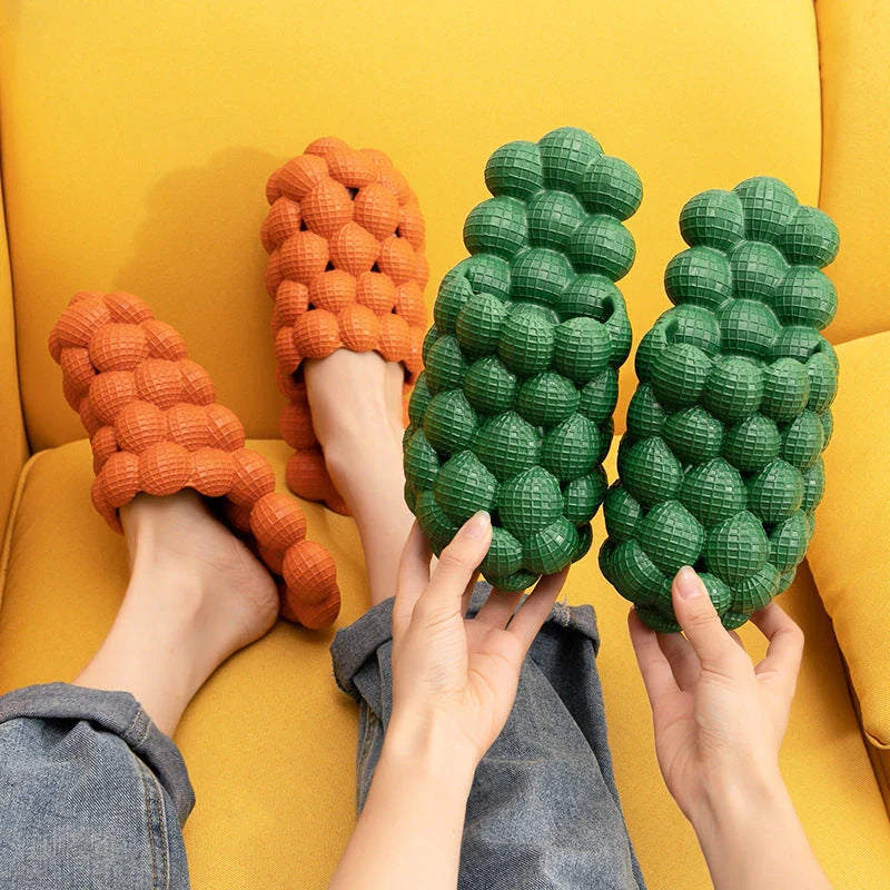 Comfortable massage bubble slides with breathable mesh upper and non-slip soles for indoor relaxation and pampering